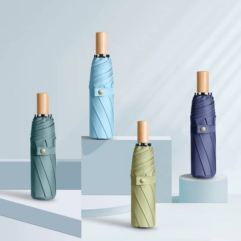 Parapluie minimaliste à trois volets contre la pluie et le soleil